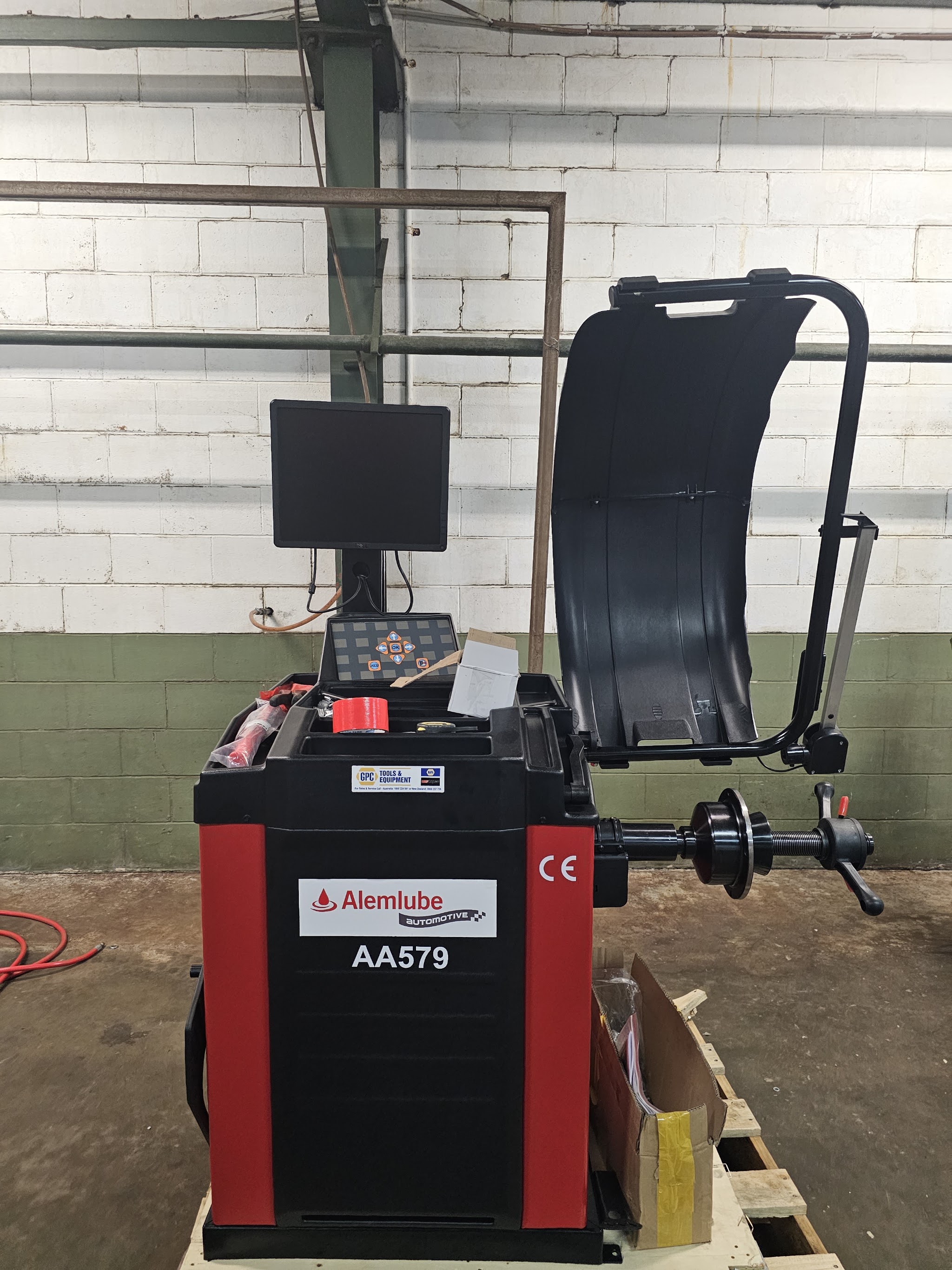 Alemlube Automotive AA579 wheel balancer at Innisfail Motors Group