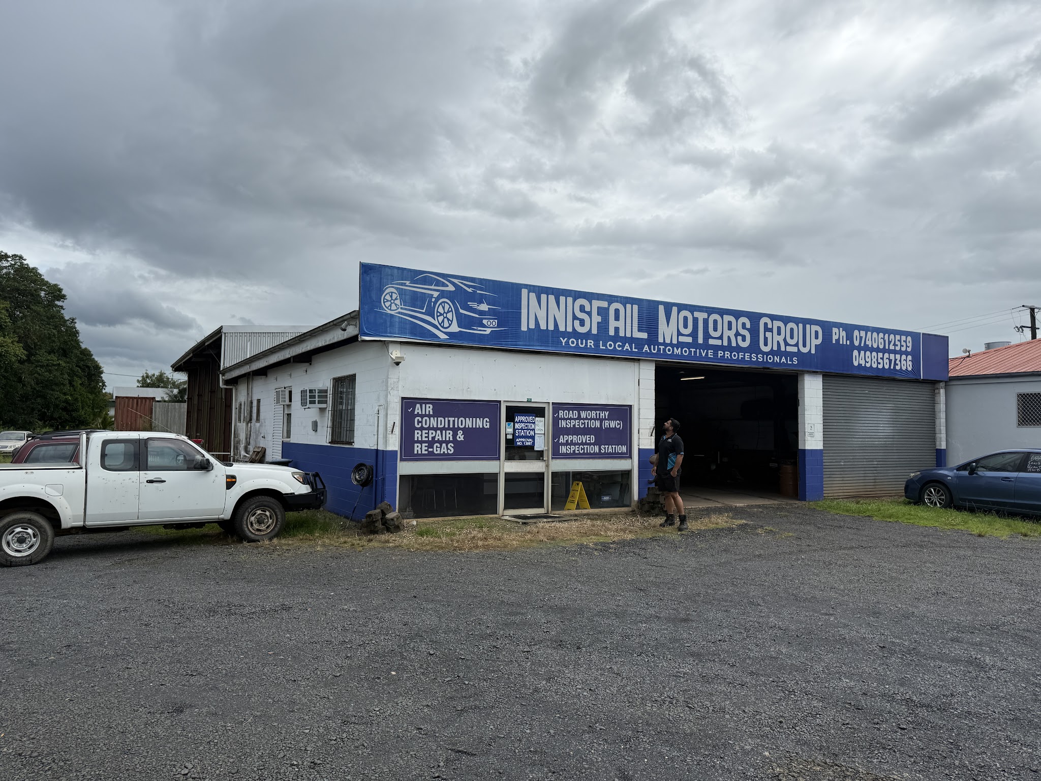 The Innisfail Motors Group workshop on Edith Street, Innisfail, with the roller door open